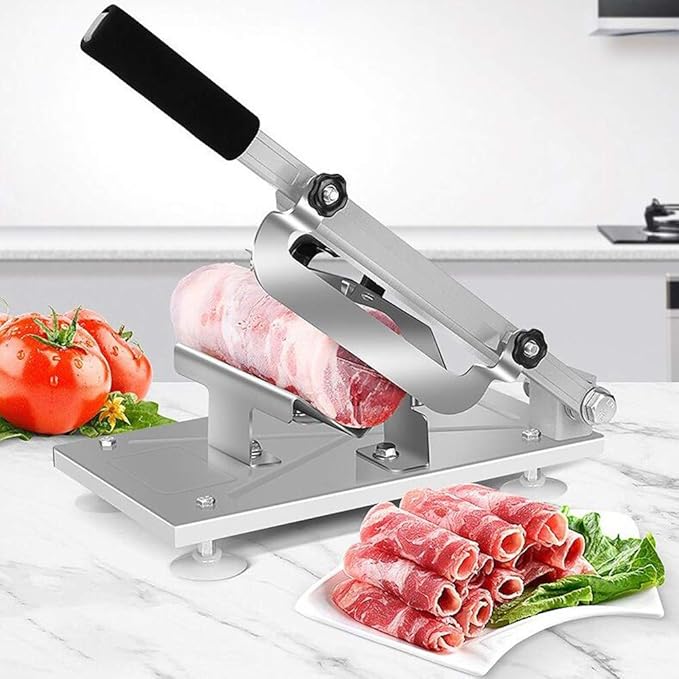 Souqzila heavy-duty meat slicer with stainless steel blade slicing raw meat on kitchen counter