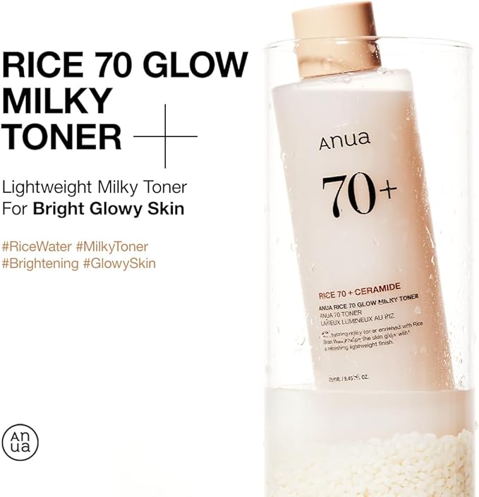 Anua Rice Milk Moisturizer 70+ Glow Milky Toner bottle submerged in water with rice grains