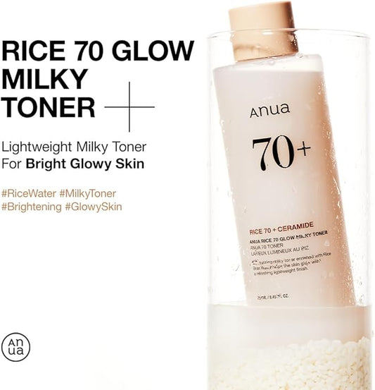 Anua Rice Milk Moisturizer 70+ Glow Milky Toner bottle submerged in water with rice grains