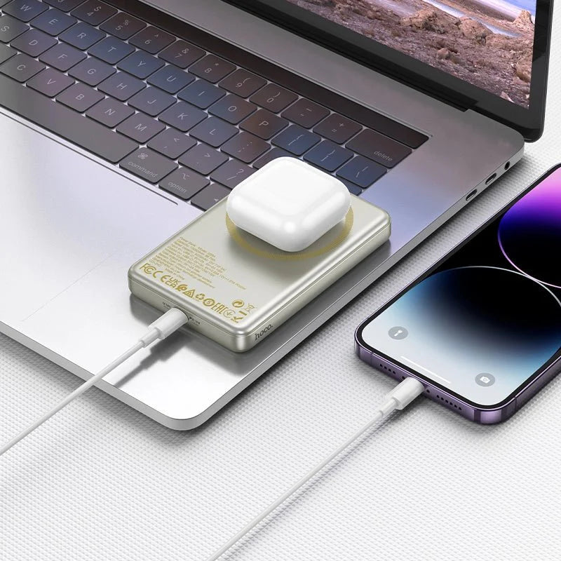 Hoco Q26 compact silver fast charging wireless power bank charging AirPods case and smartphone via USB