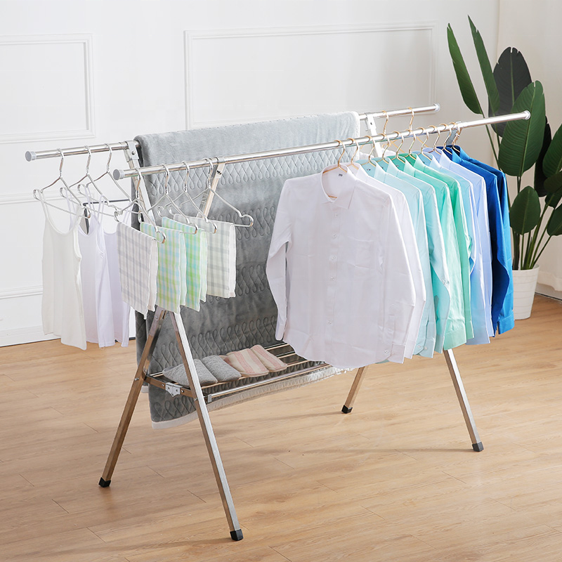 Souqzila retractable stainless steel indoor clothes drying stand with hanging shirts and towels