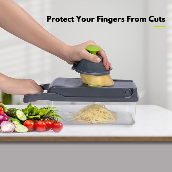 Souqzila multifunctional vegetable slicer in use with hand guard to protect fingers from cuts