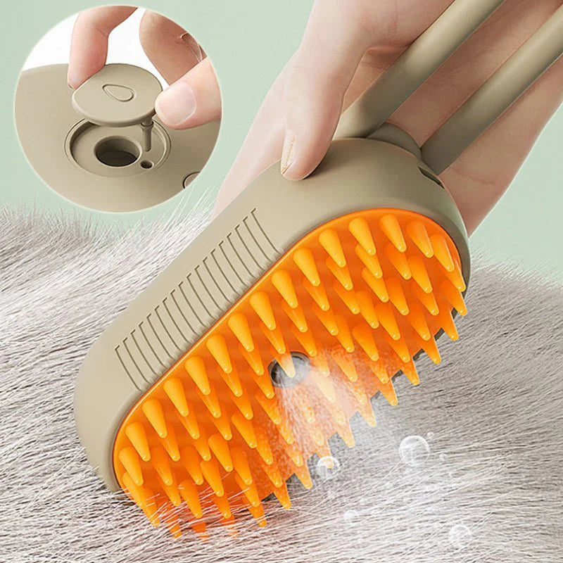 Souqzila 3 in 1 electric pet grooming brush with silicone orange bristles and spray dispenser on cat fur