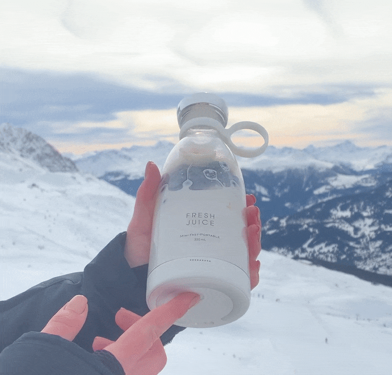 Souqzila portable juicer bottle perfect for making juice on the go in scenic mountain locations