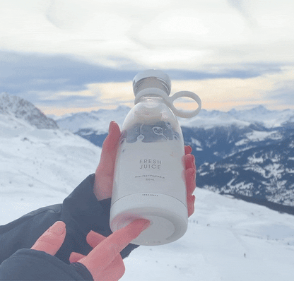 Souqzila portable juicer bottle perfect for making juice on the go in scenic mountain locations