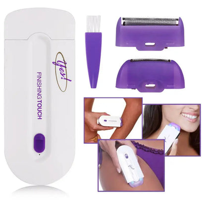 Souqzila Finishing Touch hair epilator white purple unit with two heads and cleaning brush shown on legs face underarm